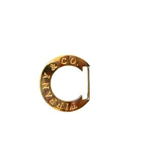 Tiffany & Co. Gold metal belt buckle . NEW